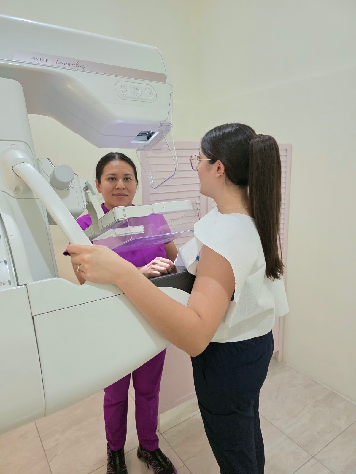 A woman receiving a mammogram screening at Imagen Médica Especializada in Puerto Peñasco